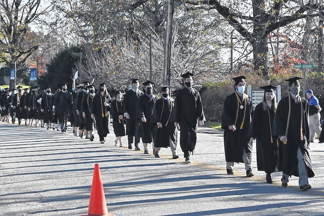 All participants and guests were required to wear masks and to have their temperature checked prior to admittance to the ceremonies.
                                 Courtesy photo