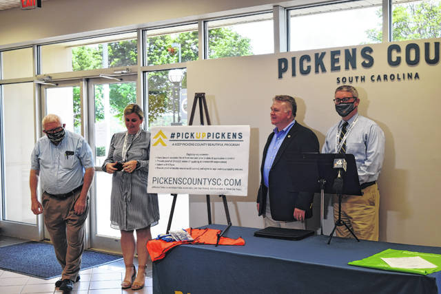 From left, Pickens County Councilman Ensley Feemster, PRT Director Allison Fowler, Council Vice Chairman Roy Costner and County Administrator Ken Roper at Mondays press conference announcing the Countys new litter program.
                                 Kasie Strickland | The Sentinel-Progress