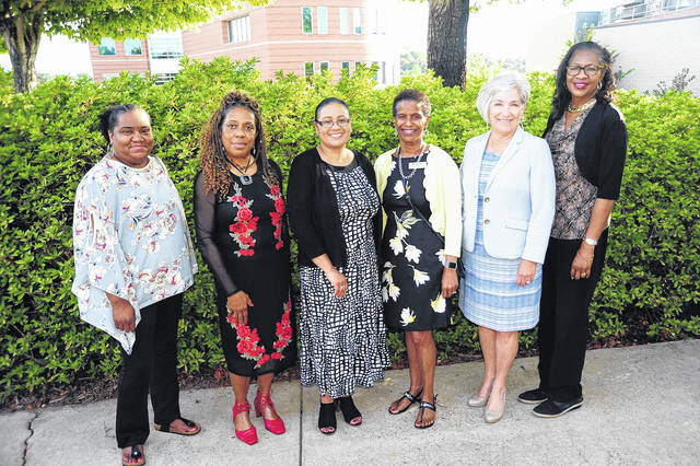 127497586_web1_c-pac-advisory-committee-of-the-year-DSC_4093
Committee Chair Karen Carter, executive director of Clemson Community Care, fifth from left, is pictured with committee members Shannon Cobb, human resources director for the Foothills Area YMCA; Dr. Sandra Sloan, South Carolina Vocational Counselor; Croslena Broadwater-Johnson, director of student support at TCTC; Emma Robinson, coordinator of student resource programs at TCTC; and Cathy Stowers, office manager, SHARE.
Courtesy of TCTC