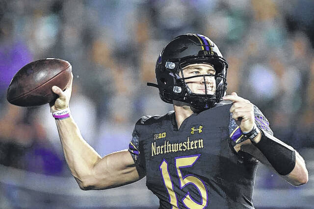 128135532_web1_1000
Northwestern quarterback Hunter Johnson throws against Michigan State during the first half of an NCAA college football game in Evanston, Ill., Friday, Sept. 3, 2021.
AP File