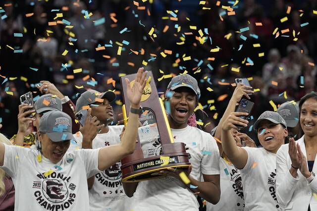128372738_web1_128372738-f42545bf12094bec9737bd6d8d9e54ce
South Carolinas Aliyah Boston holds the trophy after a college basketball game in the final round of the Womens Final Four NCAA tournament against UConn Sunday, April 3, 2022, in Minneapolis. South Carolina won 64-49 to win the championship. (AP Photo/Eric Gay)