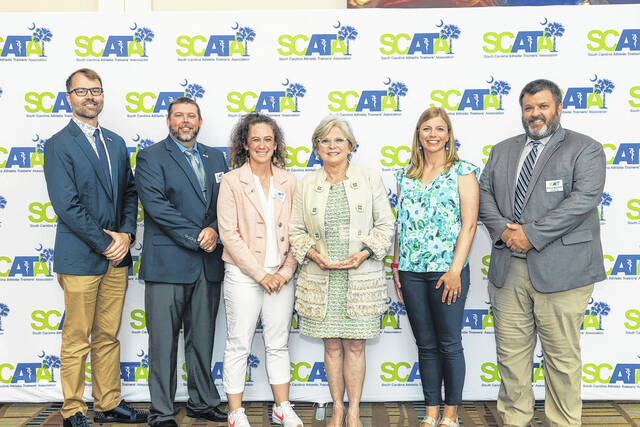 129845703_web1_SCATA-Annual-Meeting-Photo
From left, Jeremy R. Searson, PhD, SCAT, ATC, Joe Cauble, MA, SCAT, ATC, Amy Fraley-Hand, PhD, SCAT, ATC, CSCS, TSAC-F, Senator Shealy, Abby DeDecker, MHRD, SCAT, ATC, Will Christman, MS, SCAT, ATC.
Photo by Bonnie Smith
