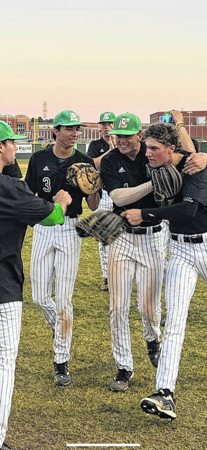 130582021_web1_Braxton-Patton
EHS senior left fielder Braxton Patton (right) gunned down a runner at home plate last week and is congratulated by Brayden Bryson and Ayden Beeco.
Jeff Holt | The Easley Progress