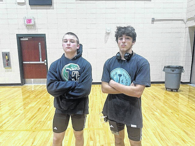 131084941_web1_ehs-wrestling-duo
Pictured are Easley High Schools Luke Arrowood and Isaac Pereia last week after pinning their Walhalla opponents in a scrimmage.
Jeff Holt | The Easley Progress