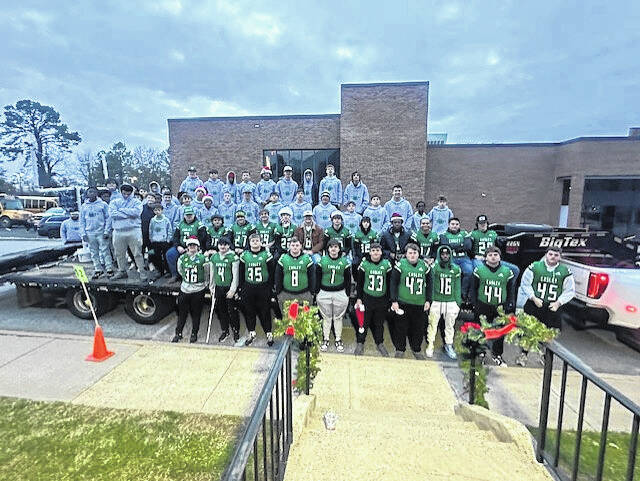 131136291_web1_Easley-fb-players-at-parade
Pictured are football players from the Gettys Middle School and the Easley High School football team who took part in the annual Christmas parade on Saturday night in downtown Easley.
Jeff Holt | The Easley Progress