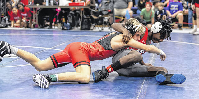 131138297_web1_C-Spence-CMYK-200-Reso-Chester-Tourney-12.7.2024
Liberty Middle School wrestler Cullen Spence (Left) begins his quest for a second state title at the Chester County Natural Gas Invitational. Cullen finished first in his bracket. (Photo by Mark Beery)