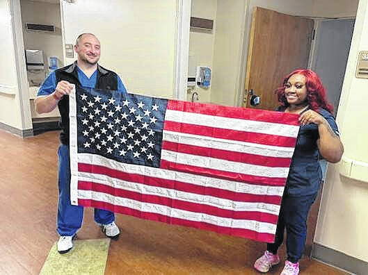 131498162_web1_Easley-Baptist-Church-flag
Pictured is Colt Shope and Alycia Fuller holding the U.S. Flag. They help with honoring the military veterans in their closing moments of their life with special dignity and gratitude.
Photo submitted