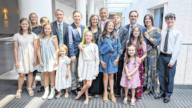 131769063_web1_lds1
The Spartanburg Stake Presidency with their families. (Courtesy photo).