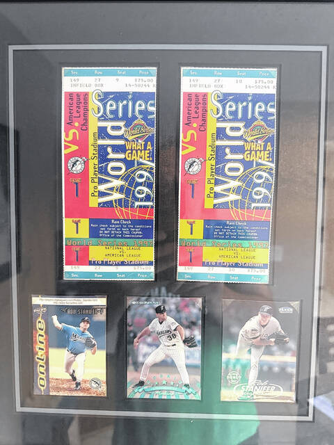 Pictured are several of Rob Stanifers Major League Baseball cards and World Series tickets from his playing days.