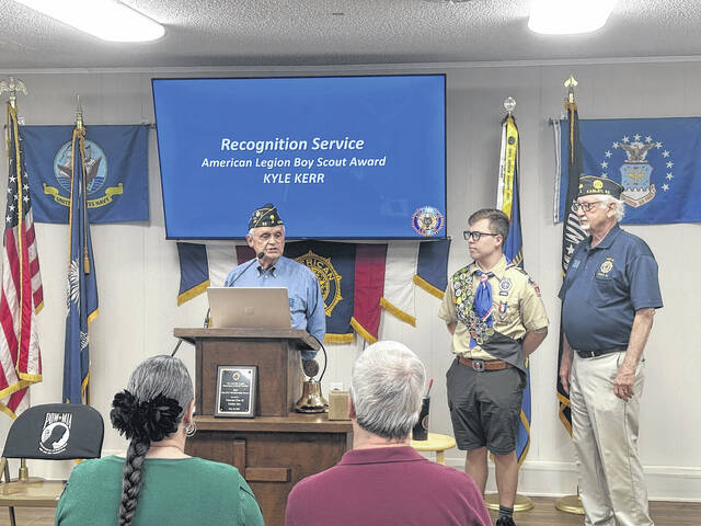Post 52 member Kent Dykes helped present the Boy Scout award last week at the monthly meeting of the American Legion. Kyle Kerr from Daniel High School took home the honors.
                                 Jeff Holt / The Easley Progress